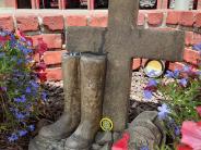 A cross and boots in the spring. Representing the faith and dedication that our Fire Fighters showcase each and every day. 